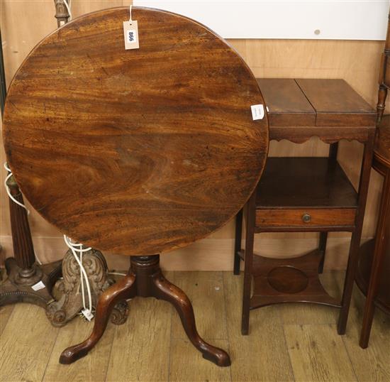 A George III mahogany circular tilt top tea table and a George III mahogany two tier washstand (2) Table W.72cm, Wash stand W.35cm